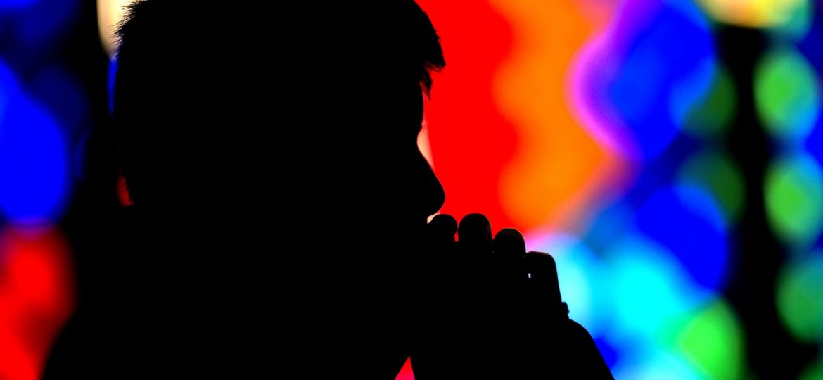 Teen prays during Mass at New York church