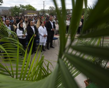 Fr. Jim Goyo leads a Palm Sunday procession from Lake Cliff Park to Blessed Sacrament Catholic parish, on Sunday, March 24, 2024 in Dallas.