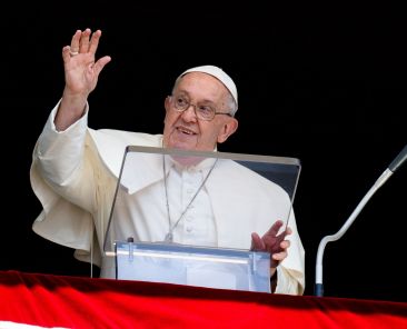 Pope Francis greets visitors gathered in St. Peter's Square to pray the Angelus at the Vatican July 28, 2024. (CNS photo/Vatican Media)