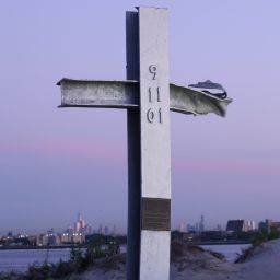 A cross made of steel from one of the fallen towers of the One World Trade Center is seen at sunrise.