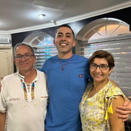 Carlos Irula and parents.