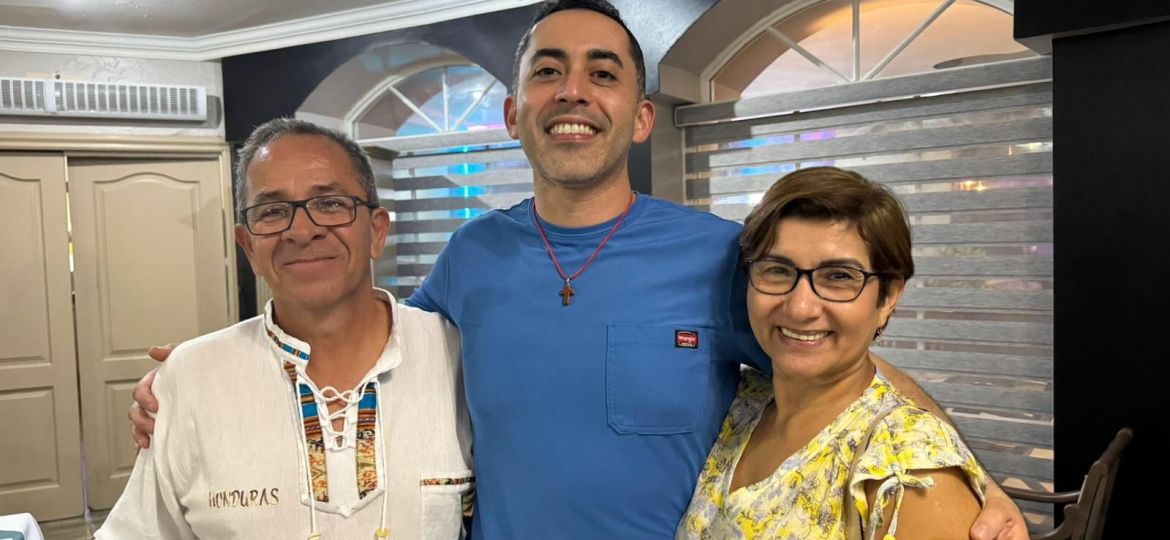 Carlos Irula and parents.