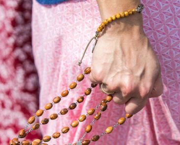 Pilgrims pray the rosary during a Eucharistic procession through the streets of Brownsville, Texas, to kickoff the St. Juan Diego Route of the National Eucharistic Pilgrimage May 19. (OSV News photo/Tom McCarthy)