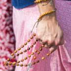 Pilgrims pray the rosary during a Eucharistic procession through the streets of Brownsville, Texas, to kickoff the St. Juan Diego Route of the National Eucharistic Pilgrimage May 19. (OSV News photo/Tom McCarthy)