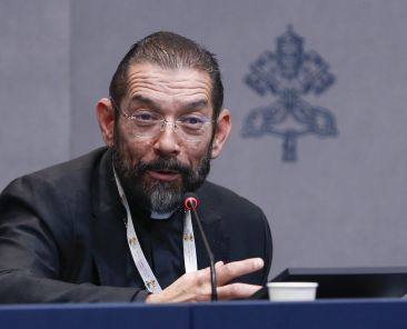 Bishop Daniel E. Flores of Brownsville, Texas, speaks at a news conference in the Vatican press office during the Synod of Bishops Oct. 3, 2024. (CNS photo/Robert Duncan)