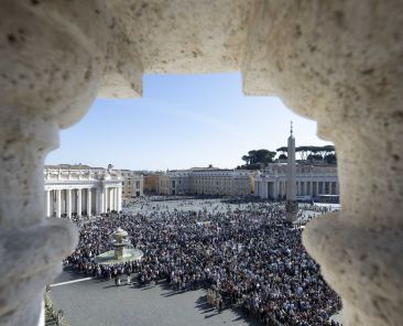 Visitors gather in St. Peter's Square to pray the Angelus with Pope Francis at the Vatican Nov. 3, 2024. (CNS photo/Vatican Media)