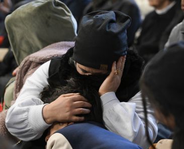 A woman and child attend Pope Francis' Mass for the World Day of the Poor in St. Peter's Basilica Nov. 17, 2024. (CNS photo/Vatican Media)