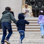 A group of children run toward Pope Francis to greet him during his weekly general audience in St. Peter's Square at the Vatican Nov. 20, 2024. (CNS photo/Pablo Esparza)