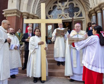 Bishop Edward J. Burns leads prayers on the steps of the National Shrine Cathedral of Our Lady of Guadalupe prior to processing inside for the celebration of the opening Mass for the Jubilee Year of Hope on Dec. 29, 2024. (Michael Gresham/The Texas Catholic)