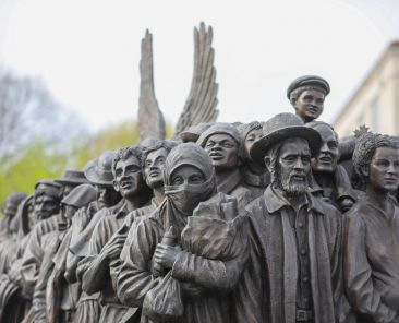 The sculpture "Angels Unawares" is seen at The Catholic University of America in Washington April 22, 2022. The life-size sculpture, which depicts a group of migrants and refugees crowded on a boat, is a replica of the original one Pope Francis unveiled in St. Peter's Square at the Vatican during the 2019 World Day of Migrants and Refugees. (OSV News/CNS file, Andrew Biraj, Catholic Standard)