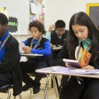 In a 2016 file photo, students at Don Bosco Cristo Rey High School in Takoma Park, Md., participate in a classroom exercise.  The Cristo Rey schools form a national network of Catholic high schools launched to meet the needs of underserved families, is honoring alumni who have become leaders in an array of industries -- and in their communities. On March 10, 2025, the Cristo Rey Network honored "40 Under 40" alumni. (OSV News photo/CNS file, Jaclyn Lippelmann, Catholic Standard)