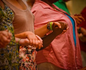 Congregants are pictured in a file photo praying for peace during Mass at All Saints Church in Milwaukee. (OSV News photo/Juan C. Medina, Catholic Herald)