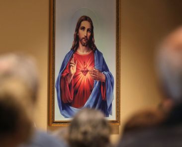 A painting of the Sacred Heart of Jesus is seen during Palm Sunday Mass at Sacred Heart Church in Prescott, Ariz., April 13, 2025. (OSV News photo/Bob Roller)