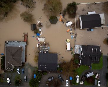A drone view shows a flooded neighborhood in Burlington, Wash., Dec. 12, 2025, as an atmospheric river brings rain and flooding to the Pacific Northwest. The catastrophic flooding forced thousands of people to evacuate. (OSV News photo/David Ryder, Reuters)