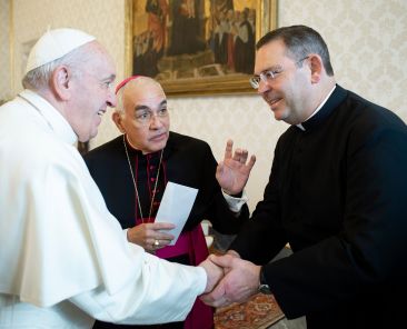 Bishop Joe S. Vásquez, then head of the Diocese of Austin Texas, gestures as Pope Francis greets Father James A. Misko, vicar general and moderator of the curia for the Diocese of Austin, at the Vatican Jan. 21, 2020. Pope Leo XIV on Dec. 22, 2025, appointed Father Misko as bishop of Tucson, Ariz. Now-Archbishop Vásquez has headed the Archdiocese of Galveston-Houston since his March 25 installation. (OSV News photo/Vatican Media via Diocese of Tucson)