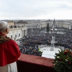 Pope Leo XIV looks out at an estimated 26,000 people gathered in St. Peter's Square at the Vatican for his solemn Christmas blessing "urbi et orbi" (to the city and the world) Dec. 25, 2025. (CNS photo/Vatican Media)