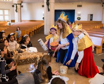On Saturday morning the children from St. Rita Catholic Community in Dallas rehearsed for the production of Three Kings Play.  (l-r) Siena Colletti played the part of Second King, Zoe-Catherine Whitfield played the part of Third King, and Luke Wilhelm played the part of First King.