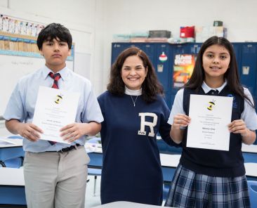(l-r) Jacob Jackson, Elizabeth Garcia-Teacher and Melanie Ortiz.  The two students  recently represented OLPH in a Spelling Bee competition.