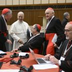 Pope Leo XIV shares a light moment with cardinals during a break as he holds a consistory with cardinals from around the world at the Vatican Jan. 8, 2026. In the foreground is Cardinal Pierbattista Pizzaballa, the Latin patriarch of Jerusalem. (OSV News photo/Simone Risoluti, Vatican Media)
