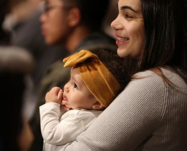 A woman holds her daughter during the opening Mass of the National Prayer Vigil for Life Jan. 19, 2023, at the Basilica of the National Shrine of the Immaculate Conception in Washington. Thousands of Catholics across the country will pray for the protection of human life starting on Jan. 16, 2026. (OSV News photo/Bob Roller)