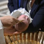Pope Leo XIV baptizes one of 20 children in the Sistine Chapel at the Vatican Jan. 11, 2026, the feast of the Baptism of the Lord. (OSV News photo/Simone Risoluti, Vatican Media)