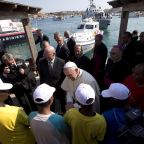 Pope Francis talks with immigrants at the port in Lampedusa, Italy, July 8, 2013. Two months after his election, the late pope visited the tiny Italian island in the Mediterranean Sea to draw attention to those who had lost their lives attempting the crossing from the African coast. On Feb. 19, 2026, the Vatican announced that Lampedusa will be one of six destinations for upcoming day trips Pope Leo XIV will make. (CNS photo/pool via Reuters)