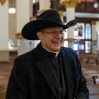 Msgr. Ruiz with Cowboy Hat (4 of 4)