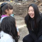 University of San Diego students and a young resident of Albergue Las Memorias in Mexico laugh together during "Tijuana Spring Breakthrough," an alternative spring break experience sponsored by the university's ministry. (CNS photo/University of San Diego) See USD-SPRING-BREAK March 20, 2019.
