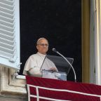 Pope Leo XIV smiles as he leads the Angelus prayer from a window of the Apostolic Palace, at the Vatican, March 22, 2026. (OSV News/ Vatican Media, Matteo Pernaselci via Reuters) THIS IMAGE WAS PROVIDED BY A THIRD PARTY.