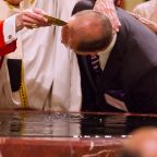 A file photo shows a catechumen being baptized during the Easter Vigil. According to a survey released March 25, 2026, by the French bishops' conference, over 20,000 catechumens in France are expected to be baptized during the Easter Vigil, marking a 20% increase compared to baptisms in 2025. (OSV News photo/James Ramos, Texas Catholic Herald)