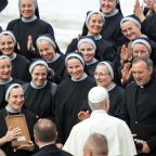 Pope Leo XIV greets a group of religious sisters and priests in the Paul VI Audience Hall at the conclusion of his weekly general audience at the Vatican Aug. 20, 2025. In his first message for the World Day of Prayer for Vocations, Pope Leo said March 25, 2026, that in discerning one's vocation, it is essential to cultivate trust in the Lord. The vocations day is April 26. (CNS photo/Lola Gomez)