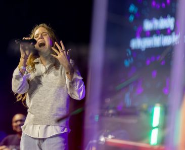 Anne Elise Diaz sings “Goodbye Yesterday” during praise and worship Feb. 14 at the 2026 Dallas Catholic Youth Conference at the Frisco Convention Center in Frisco. (Michael Gresham/The Texas Catholic)
