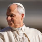 Pope Leo XIV smiles as he greets visitors and pilgrims from the popemobile while riding around St. Peter’s Square at the Vatican before his weekly general audience April 8, 2026. (CNS photo/Lola Gomez)