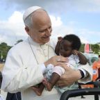 Pope Leo XIV holds a baby at the Sanctuary of Our Lady of Muxima in Muxima, Angola, April 19, 2026. (OSV News photo/Simone Risoluti, Vatican Media)