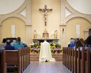 Father Rob Ketcham, pastor of Christ the King Church in Commack, N.Y., kneels before the Blessed Sacrament during a Holy Hour marking the feast of Divine Mercy April 16, 2023. (OSV News photo/Gregory A. Shemitz)