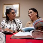 Viviana Ortega, left, and Carmen Rodriguez discuss a topic during a night of reflection, on Feb. 19, 2026 at St. Mark the Evangelist Catholic parish in Plano. The reflection is part of an initiative called, Let God Write the Script of your Life, named after Guzman’s book.