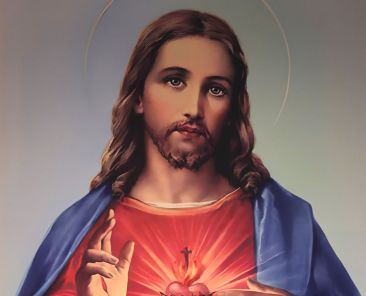 A painting of the Sacred Heart of Jesus is seen during Palm Sunday Mass at Sacred Heart Church in Prescott, Ariz., April 13, 2025. (OSV News photo/Bob Roller)