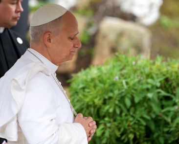 Pope Leo XIV prays during a visit to the archaeological site of Hippo in Annaba, Algeria, April 14, 2026. The site represents the ancient city where St. Augustine, the founder of the pope's religious order, served as bishop in the 4th century. (CNS photo/Lola Gomez)