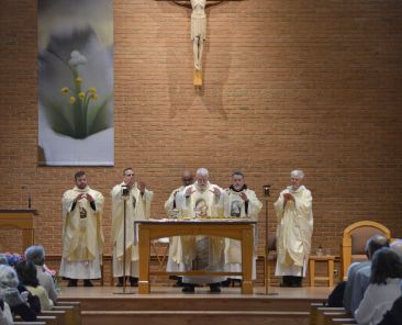 Augustinians priests concelebrate a Mass of thanksgiving for the first anniversary of their brother Pope Leo XIV’s papacy at St. Jude Catholic Church in New Lenox, Ill., May 8, 2026. Among the concelebrants is Passionist Father Enzo Del Brocco, second from left. (OSV News photo/Simone Orendain)