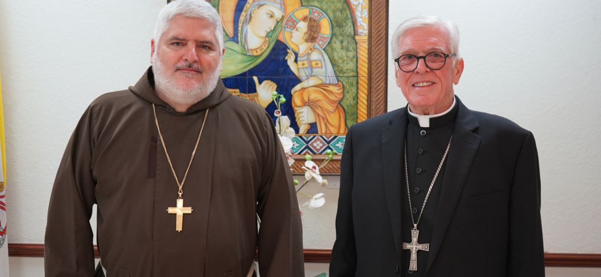 FATHER EMILIO BIOSCA AGÜERO AND BISHOP FRANK J. DEWANE