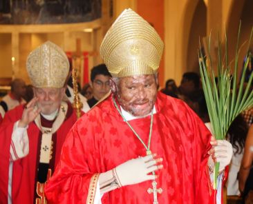 Bishop Pierre-André Dumas of Anse-à-Veau-Miragoâne, Haiti, processes during Palm Sunday Mass at St. Mary Cathedral in Miami March 29, 2026. (OSV News photo/Andoni Biurrarena, Florida Catholic)