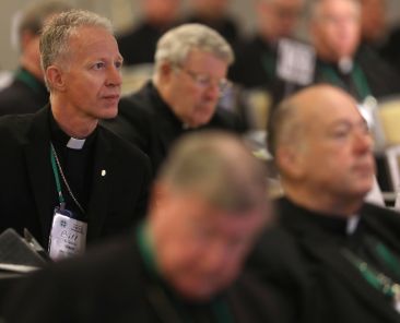 Bishop William A. Wack of Pensacola-Tallahassee, Fla., and other prelates listen to a speaker June 16, 2023, during the U.S. Conference of Catholic Bishops' spring plenary assembly in Orlando, Fla. The USCCB's 2026 spring assembly will be held in Orlando June 10-12, with public sessions scheduled for June 10 and 11. (OSV News photo/Bob Roller)