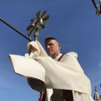 Bishop Stephen D. Parkes of Savannah carries the Blessed Sacrament ashore in St. Marys, Georgia, during the second day of the 2026 National Eucharistic Pilgrimage May 25, 2026. (OSV News photo/Anne T. Heinlein)