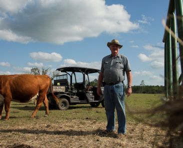 Cattle farmer Ray Hodges tends to livestock on his 300-acre farm as rising fuel costs impact agricultural production in Old Town, Fla., April 27, 2026. On April 14, the American Farm Bureau Federation reported, "Rising input costs tied to the conflict in the Middle East are adding strain to an already challenging farm economy." (OSV News photo/Maria Alejandra Cardona, Reuters)