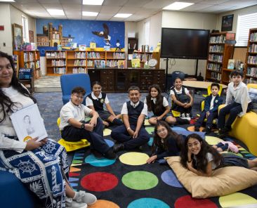 The Teacher Lala Library at St. Mary of Carmel School in Dallas was named after teacher Lala who not only taught at the school for many years but was also an alumna. (front l-r) Ms. Sanchez, Juan Rodriguez, Arturo Bueno, Diana Reyes, Victoria Burciaga; (back l-r) Isabella Cruz, Ximena Ruiz, Nazareth Yanez, Joel Esequivel and Diego Esequivel.
