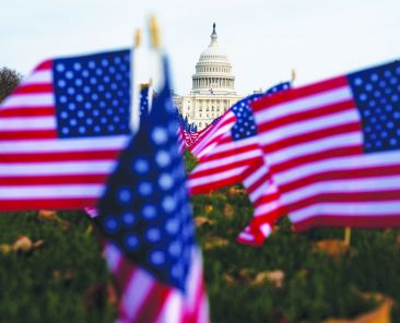American flags flutter in front of the U.S. Capitol in Washington Nov. 7, 2025. A 2026 study from the Pew Research Center shows more Americans are acquainted with the term "Christian nationalism," but on balance, more of them are likely to hold a negative rather than positive view of it. (OSV News photo/Nathan Howard, Reuters)