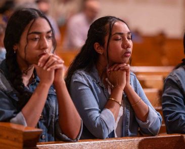 Two young women participate in a worldwide rosary for peace May 30, 2026, at the Basilica of the National Shrine of the Immaculate Conception in Washington. Archbishop Gabriele G. Caccia, apostolic nuncio to the United States, led the rosary at the basilica, while Pope Leo XIV presided over the Marian devotion from the Lourdes grotto in the Vatican Gardens, uniting Marian shrines around the world. (OSV News photo/Mihoko Owada, Catholic Standard)