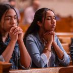 Two young women participate in a worldwide rosary for peace May 30, 2026, at the Basilica of the National Shrine of the Immaculate Conception in Washington. Archbishop Gabriele G. Caccia, apostolic nuncio to the United States, led the rosary at the basilica, while Pope Leo XIV presided over the Marian devotion from the Lourdes grotto in the Vatican Gardens, uniting Marian shrines around the world. (OSV News photo/Mihoko Owada, Catholic Standard)