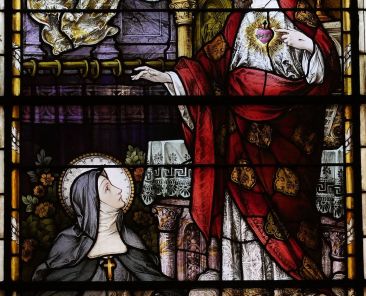 The revelation of the Sacred Heart of Jesus to St. Margaret Mary Alacoque is depicted in a stained-glass window at St. Ignatius Loyola Church in the Upper East Side neighborhood of New York City. The U.S. bishops will consecrate the United States to Jesus' Sacred Heart June 11, 2026. (OSV News photo/Gregory A. Shemitz)