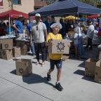 A volunteer helps move boxes of packaged dried food June 13, 2026, during the Million Meal Event at Cathedral Catholic High School in San Diego. Over the course of two days, approximately 5,100 people, mostly from San Diego-area Catholic parishes, assembled 2 million packages of red lentils, rice, dried vegetables and vitamins to be distributed to needy communities within the San Diego Diocese as well as in neighboring Tijuana, Mexico. (OSV News photo/David Maung)